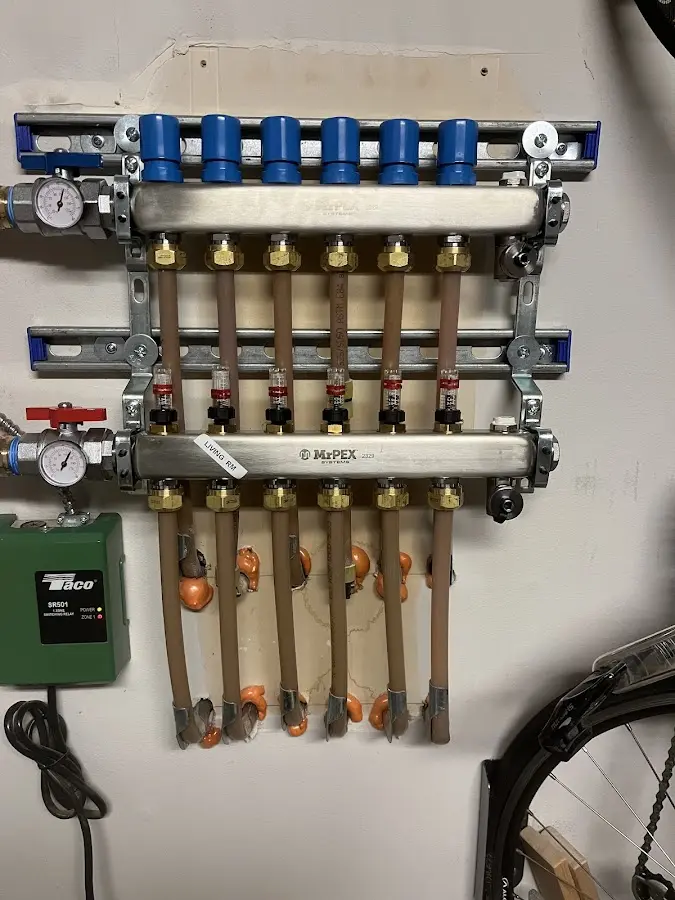 Plumber performing Gas Line Installation at a residential property in Denmark